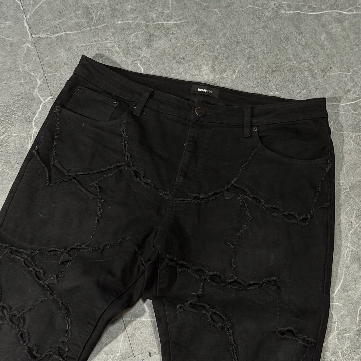 Nova Distressed Flared Jeans